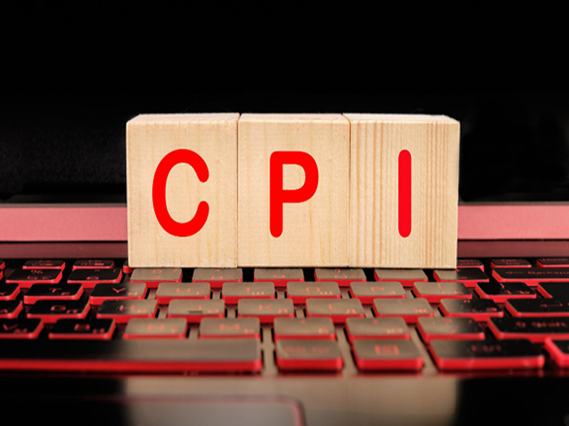 cpi_consumer_price_index_written_wooden_cubes_laptop_keyboard
